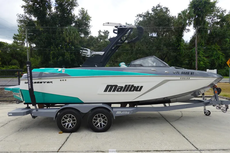 Slide: The Image of 2021 Malibu Wakesetter 22 LSV boat on trailer, side view, outdoors. - 5
