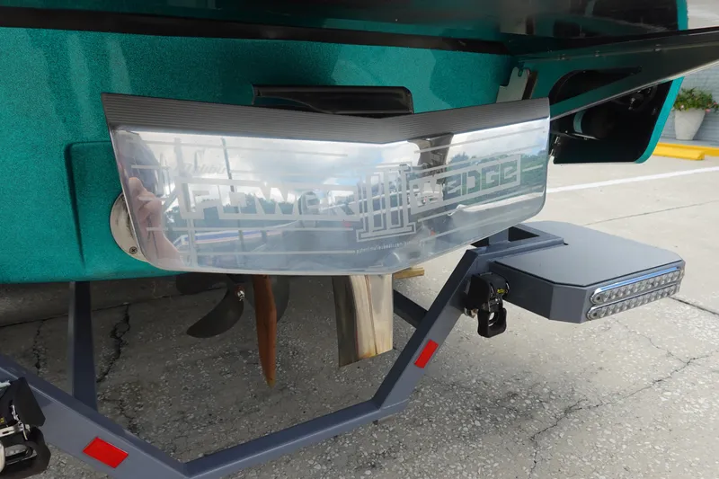 Slide: The Image of 2021 Malibu Wakesetter 22 LSV boat with Power Wedge feature, rear view. - 7