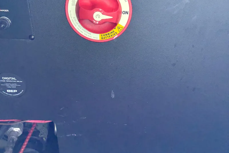 Slide: The Image of Control panel of a 2025 Regal LS2 boat with battery switch and digital relay. - 16