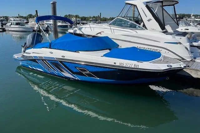 The Image of 2017 Monterey M-45 boat with blue cover docked in marina. - 0
