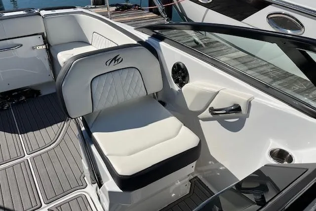 Slide: The Image of 2017 Monterey M-45 boat interior with white seating and sleek design. - 12