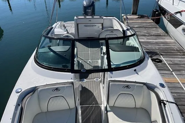 Slide: The Image of 2017 Monterey M-45 boat docked, featuring sleek design and comfortable seating. - 20