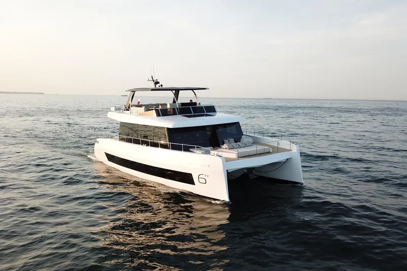 The Image of Luxury 2026 Moon Yachts 6ty catamaran cruising on open water. - 0