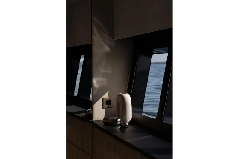 Slide: The Image of Interior of 2026 Moon Yachts 6ty with ocean view through windows. - 17