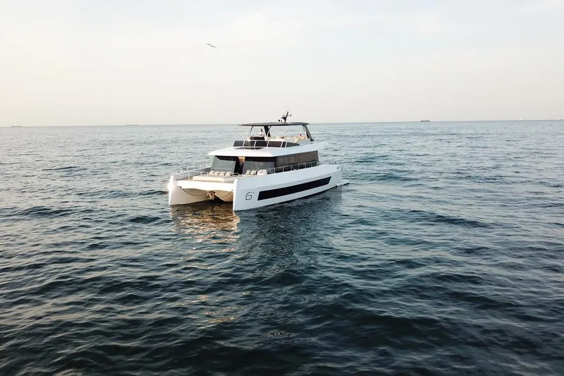 Slide: The Image of Luxury Moon Yachts 6ty 2026 model cruising on open sea. - 39