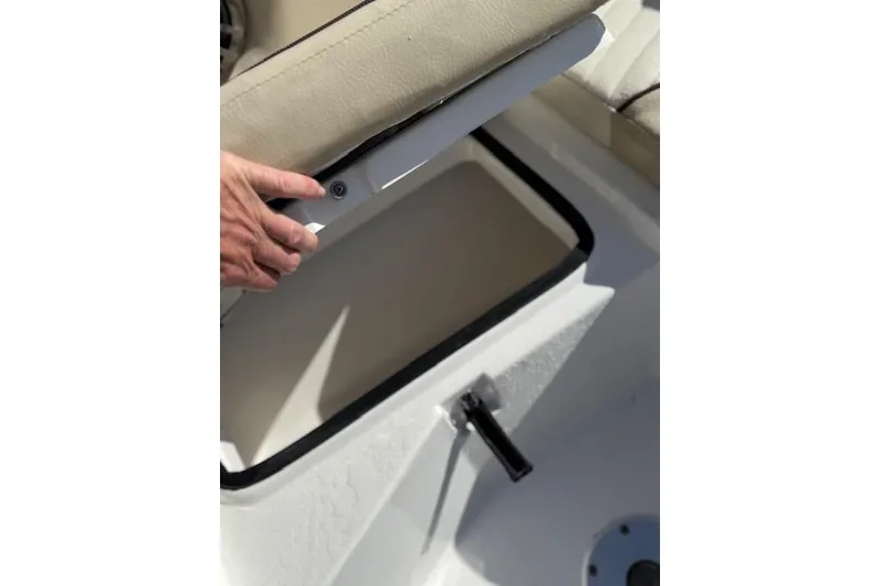 Slide: The Image of 2018 Sea Fox 226 Traveler boat seat storage compartment being opened. - 16