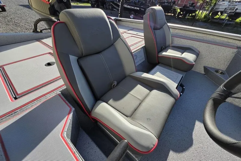 Slide: The Image of 2025 Xpress H18C Crappie boat interior with comfortable seating and modern design. - 12