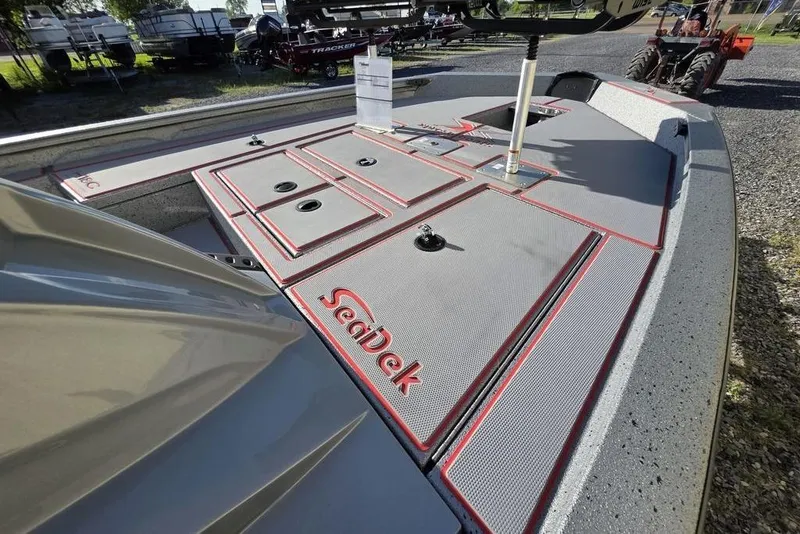 Slide: The Image of 2025 Xpress H18C Crappie boat deck with SeaDek flooring, featuring storage compartments. - 14