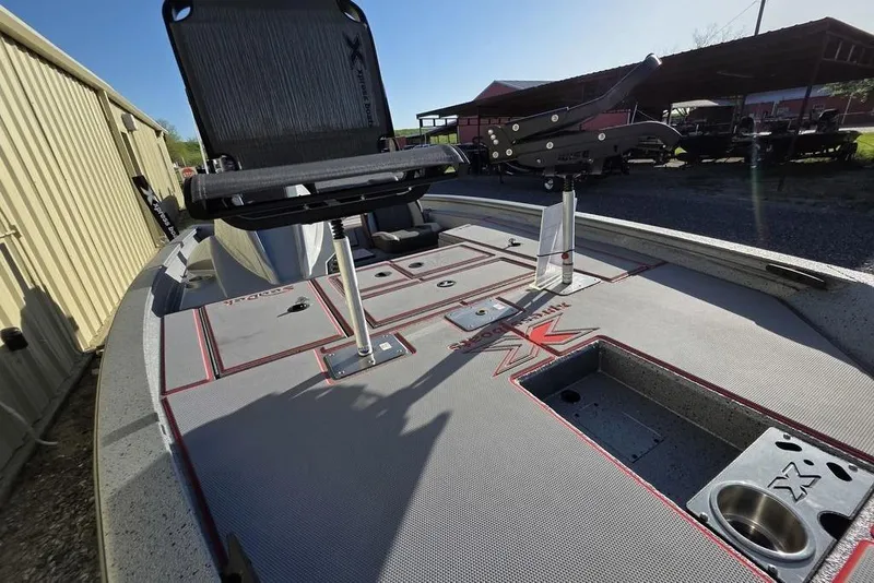 Slide: The Image of 2025 Xpress H18C Crappie boat deck with seating and fishing rod holder. - 15