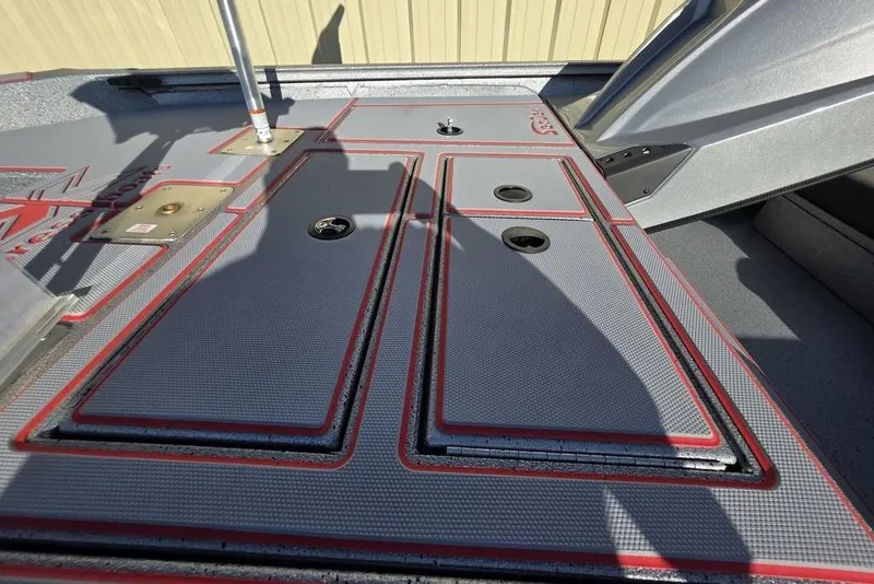 Slide: The Image of 2025 Xpress H18C Crappie boat deck with storage compartments and sleek design. - 19
