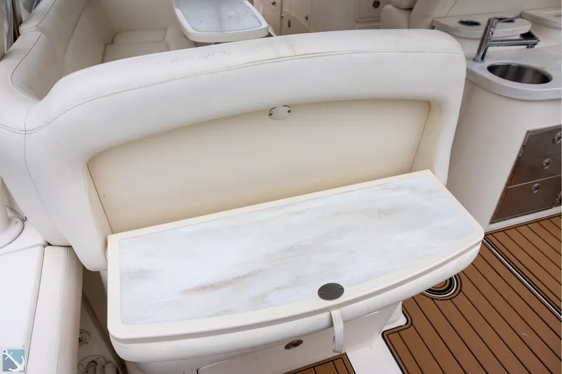 Slide: The Image of 2019 Grady-White Freedom 335 boat interior with seating and sink area. - 15