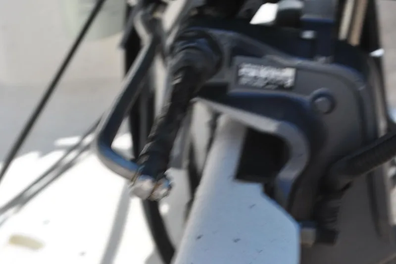 Slide: The Image of Blurry close-up of a 2003 Cape Craft 16 boat component. - 13