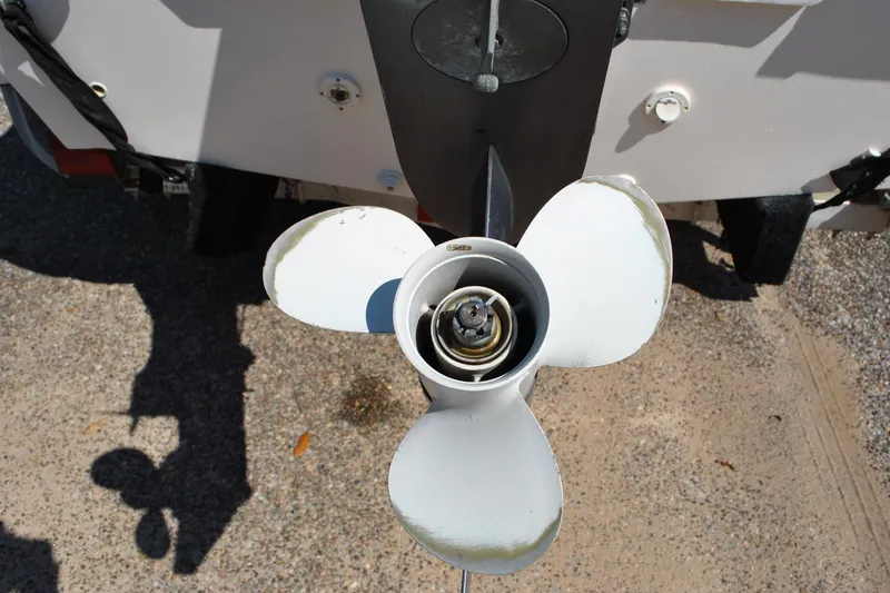 Slide: The Image of Propeller of a 2003 Cape Craft 16 boat on a trailer. - 25