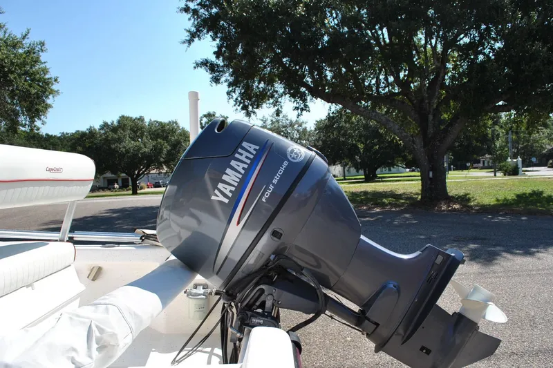 Slide: The Image of Cape Craft 16 boat with Yamaha outboard motor, 2003 model, parked outdoors. - 26