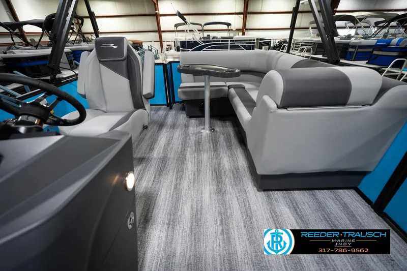 Slide: The Image of 2026 Bennington 188 SL pontoon boat interior with gray seating and modern design. - 16