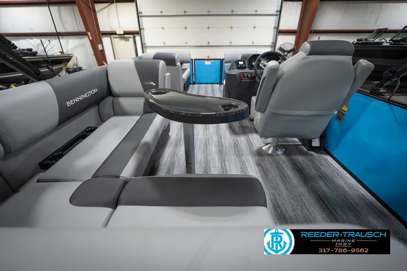 Slide: The Image of Interior of 2026 Bennington 188 SL pontoon boat with gray seating and modern design. - 18