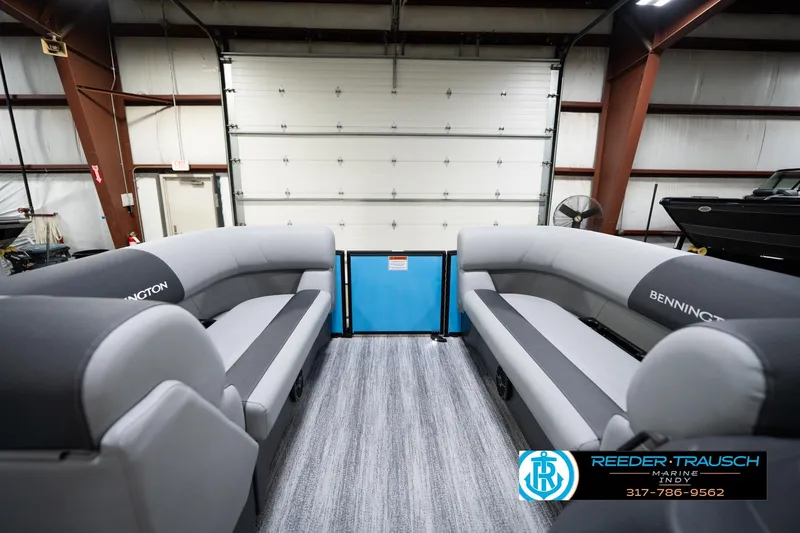 Slide: The Image of Interior view of 2026 Bennington 188 SL pontoon boat in a showroom. - 20