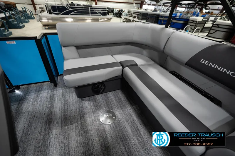 Slide: The Image of 2026 Bennington 188 SL pontoon boat interior with gray seating and carpeted flooring. - 27