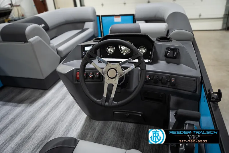 Slide: The Image of Interior view of 2026 Bennington 188 SL boat with modern steering console. - 30
