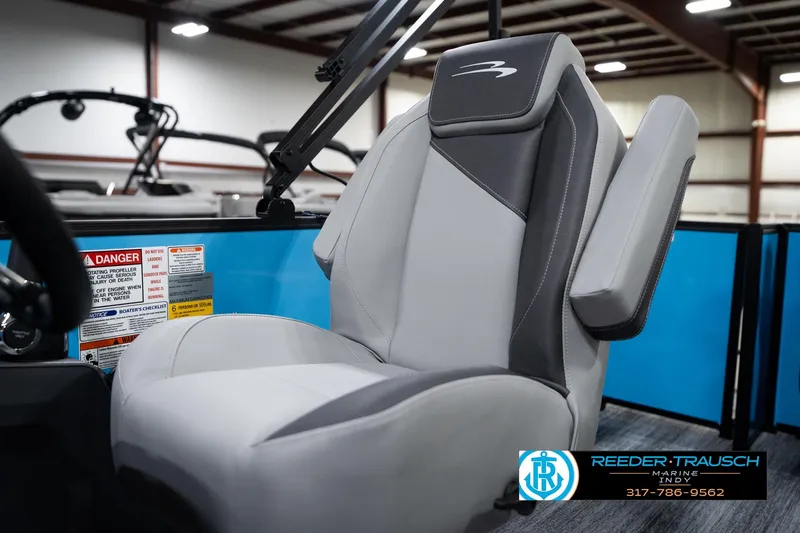 Slide: The Image of 2026 Bennington 188 SL boat seat in a showroom, featuring gray and black upholstery. - 39