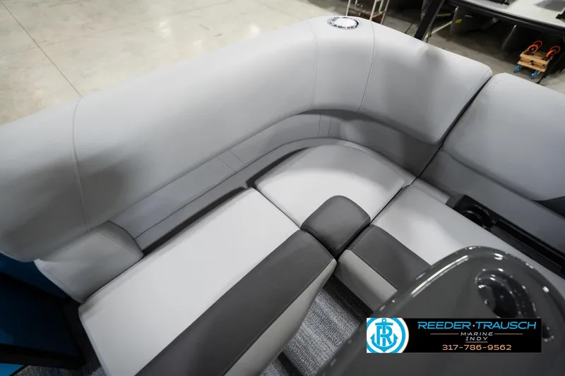 Slide: The Image of 2026 Bennington 188 SL boat interior with gray seating and armrest detail. - 41