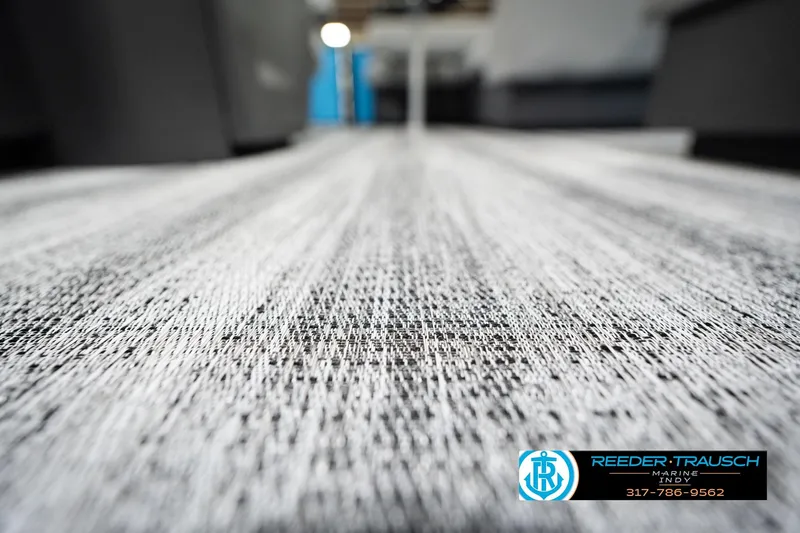Slide: The Image of Close-up of textured flooring on a 2026 Bennington 188 SL boat. - 46