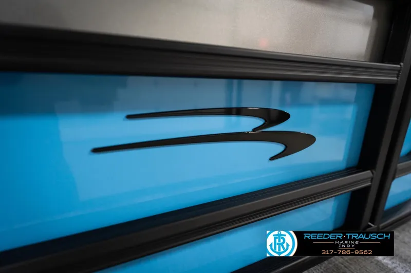 Slide: The Image of 2026 Bennington 188 SL boat with sleek blue and black design. - 47