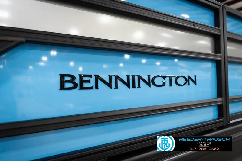 Slide: The Image of 2026 Bennington 188 SL boat with blue and white paneling, Reeder-Trausch Marine logo. - 48