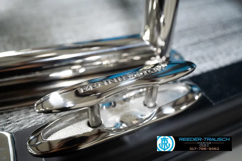 Slide: The Image of Close-up of 2026 Bennington 188 SL boat cleat with Reeder-Trausch Marine logo. - 52