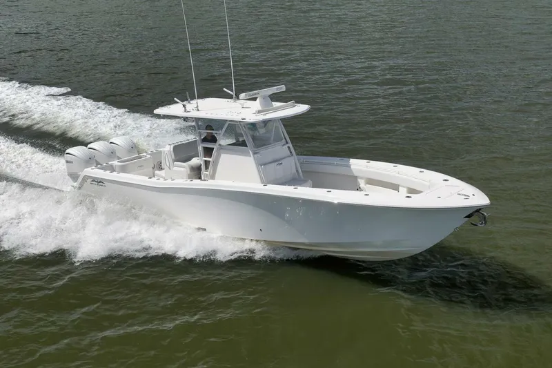 Slide: The Image of 2018 Invincible 36' Open Fisherman boat cruising on water. - 10