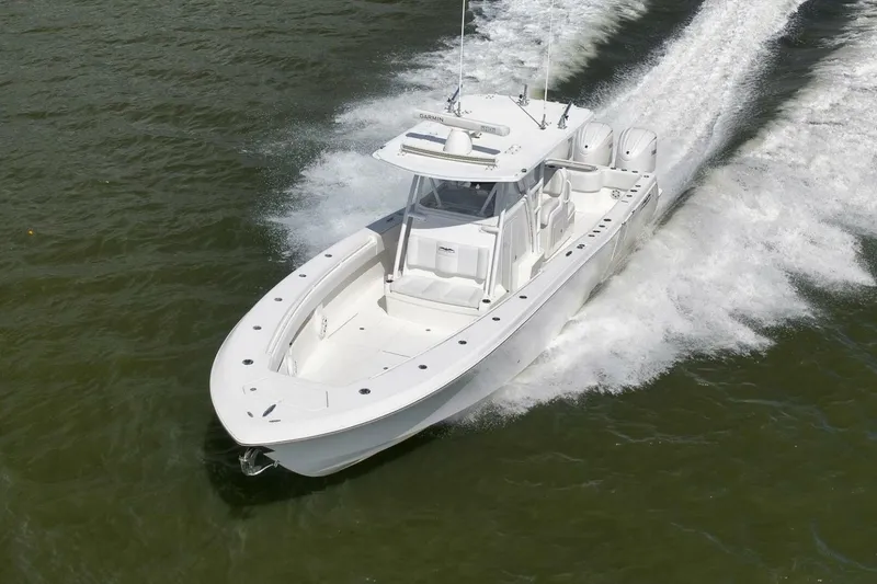 Slide: The Image of 2018 Invincible 36' Open Fisherman boat cruising on water. - 11