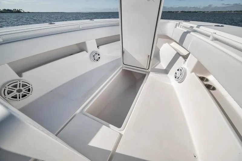 Slide: The Image of 2018 Invincible 36' Open Fisherman boat interior with storage and speakers. - 18