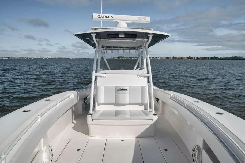 Slide: The Image of 2018 Invincible 36' Open Fisherman boat on calm waters, featuring Garmin equipment. - 19