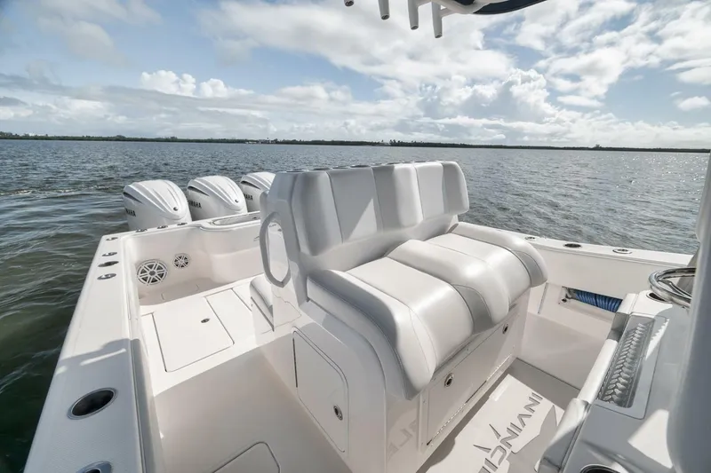 Slide: The Image of 2018 Invincible 36' Open Fisherman boat with Yamaha engines on calm water. - 24