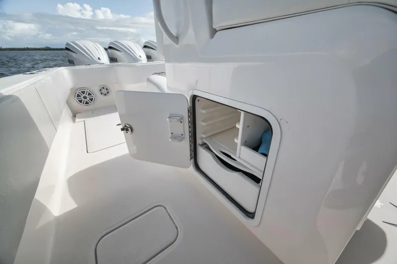 Slide: The Image of 2018 Invincible 36' Open Fisherman boat with open storage compartment and Yamaha engines. - 25