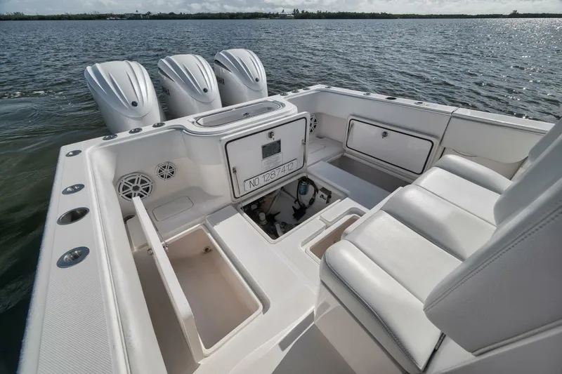 Slide: The Image of 2018 Invincible 36' Open Fisherman boat interior with triple outboard engines. - 27