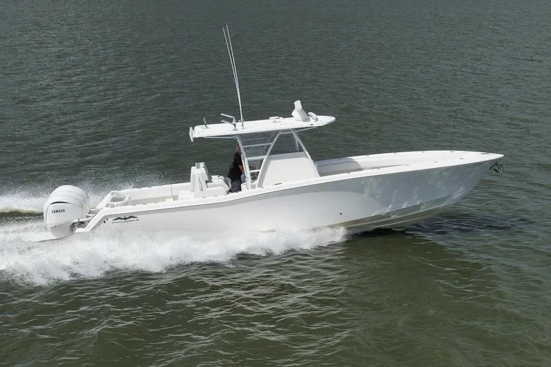 Slide: The Image of 2018 Invincible 36' Open Fisherman boat cruising on water. - 9