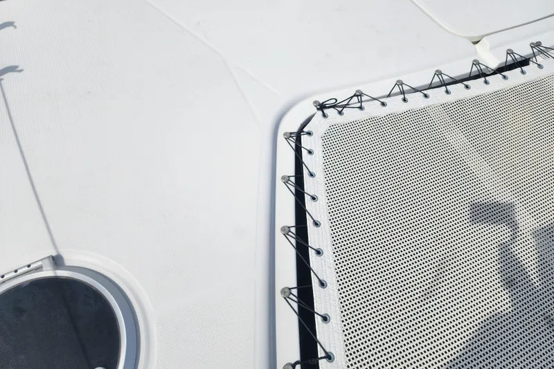 Slide: The Image of Deck of 2013 Fountaine Pajot Lipari 41 catamaran with netting and hatch. - 14