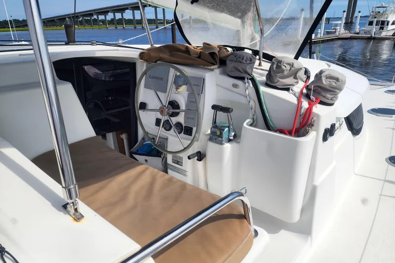 Slide: The Image of Cockpit of 2013 Fountaine Pajot Lipari 41 catamaran with steering wheel and navigation equipment. - 19