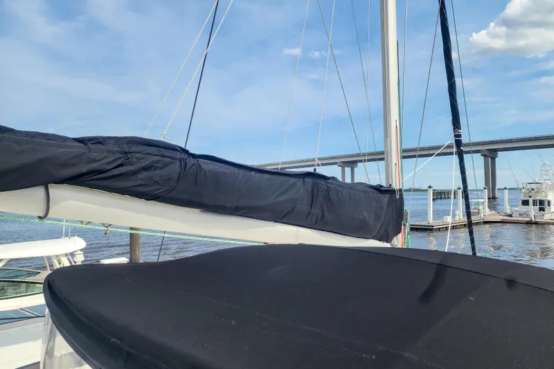 Slide: The Image of 2013 Fountaine Pajot Lipari 41 catamaran docked near a bridge on a sunny day. - 23