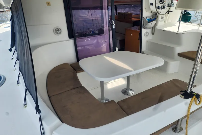 Slide: The Image of 2013 Fountaine Pajot Lipari 41 catamaran cockpit with seating and table. - 29