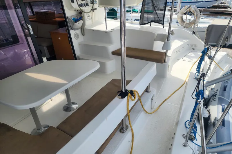 Slide: The Image of 2013 Fountaine Pajot Lipari 41 catamaran cockpit with seating and table. - 30