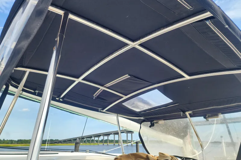 Slide: The Image of View from a 2013 Fountaine Pajot Lipari 41 catamaran, showcasing its canopy and a distant bridge. - 33