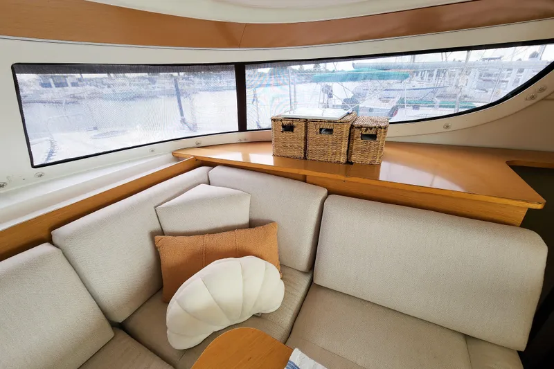 Slide: The Image of Interior of 2013 Fountaine Pajot Lipari 41 catamaran with cozy seating and decorative pillows. - 41