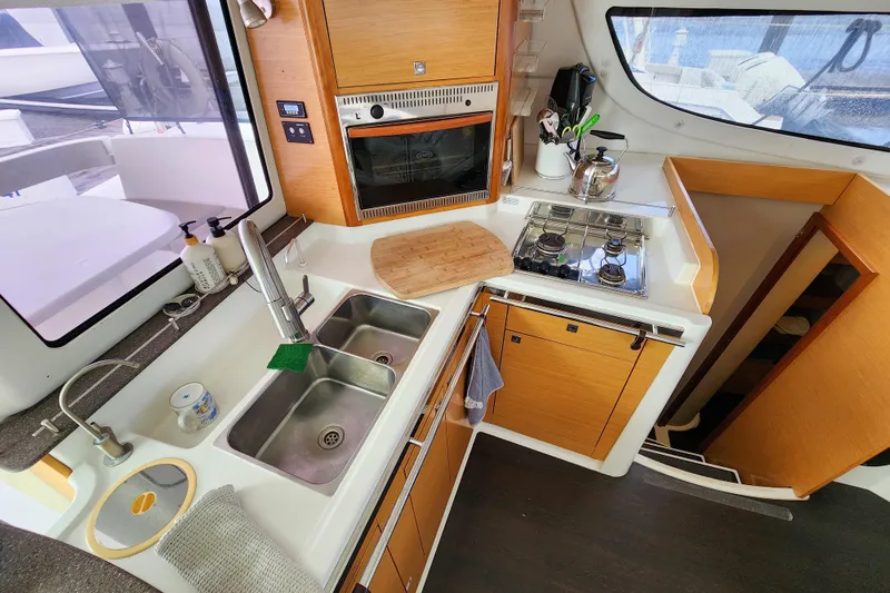 Slide: The Image of Modern kitchen in 2013 Fountaine Pajot Lipari 41 catamaran with stove, sink, and oven. - 45