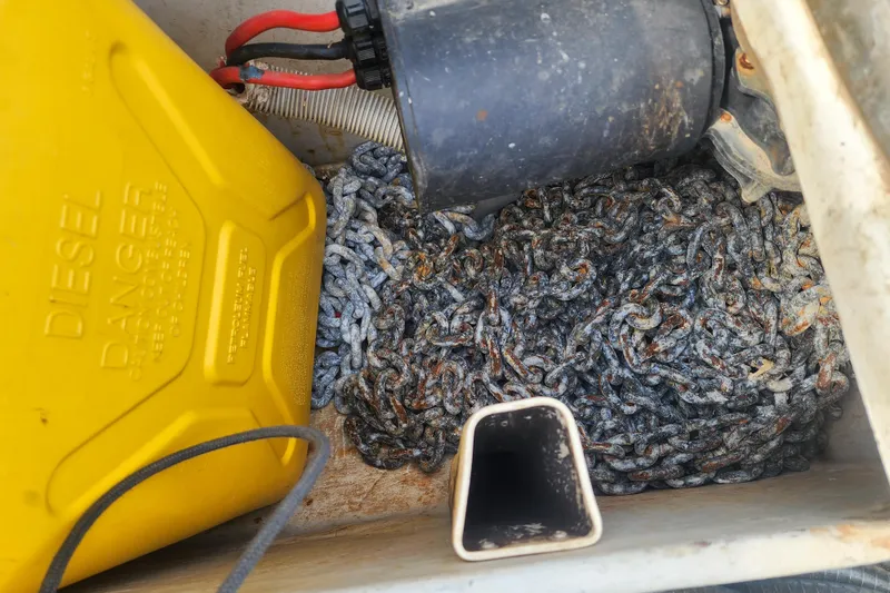 Slide: The Image of Engine compartment of a 2013 Fountaine Pajot Lipari 41 catamaran, showcasing mechanical components. - 55