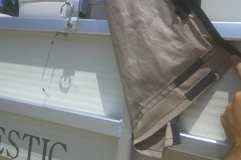 Slide: The Image of 1999 Premier 250 Grand Majestic boat detail with cover and hardware. - 5