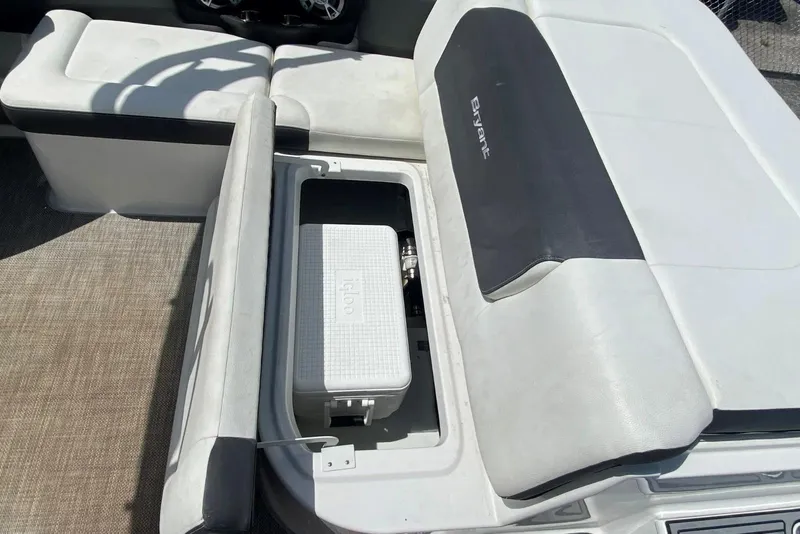 Slide: The Image of 2019 Bryant Speranza boat interior with storage compartment and cooler. - 7