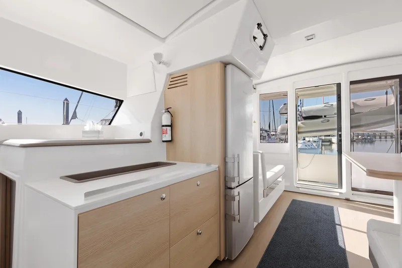 Slide: The Image of Modern interior of 2018 Bali 4.0 yacht with sleek kitchen and marina view. - 12