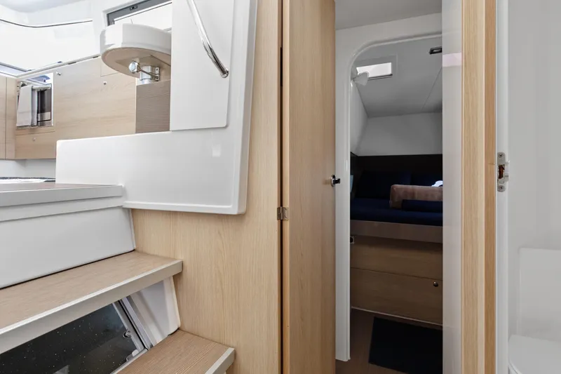 Slide: The Image of Interior of 2018 Bali 4.0 yacht, featuring modern cabin and wooden finishes. - 25